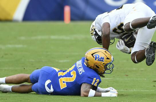 Pitt defense smothers UCF in rain-soaked game