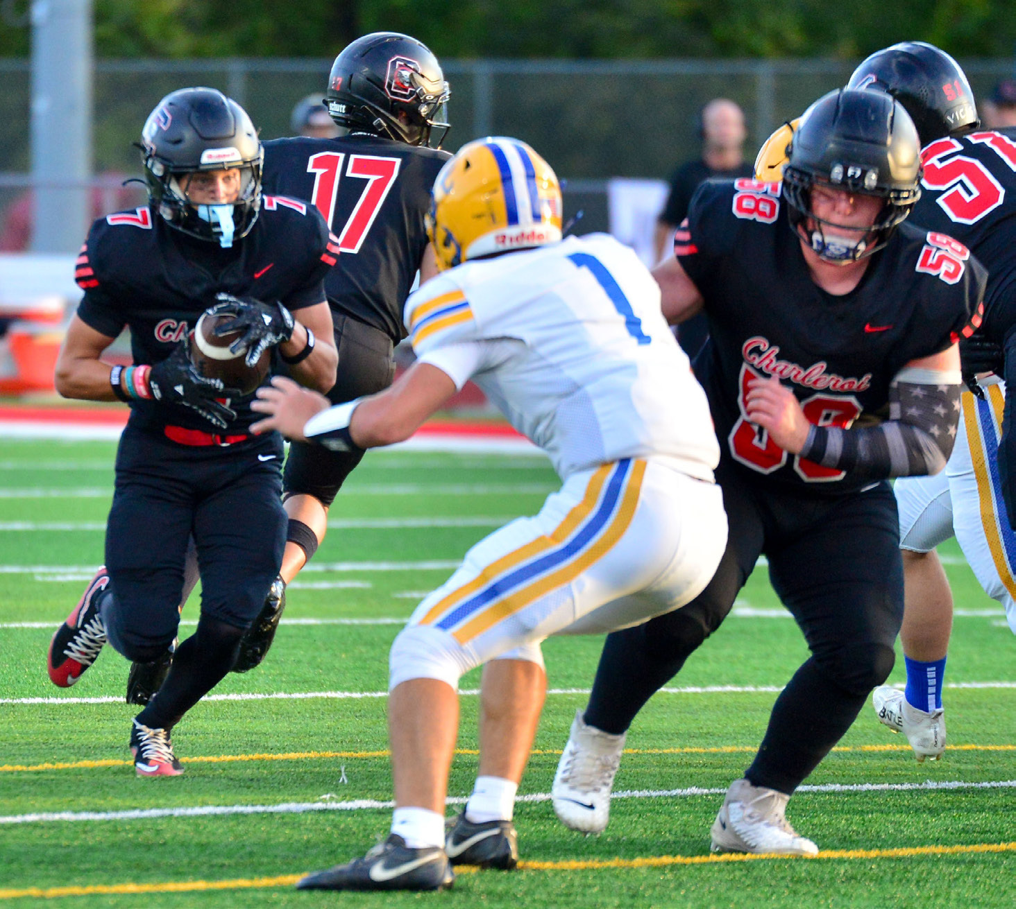 Payne's three TD passes lead Hounds past Commodores