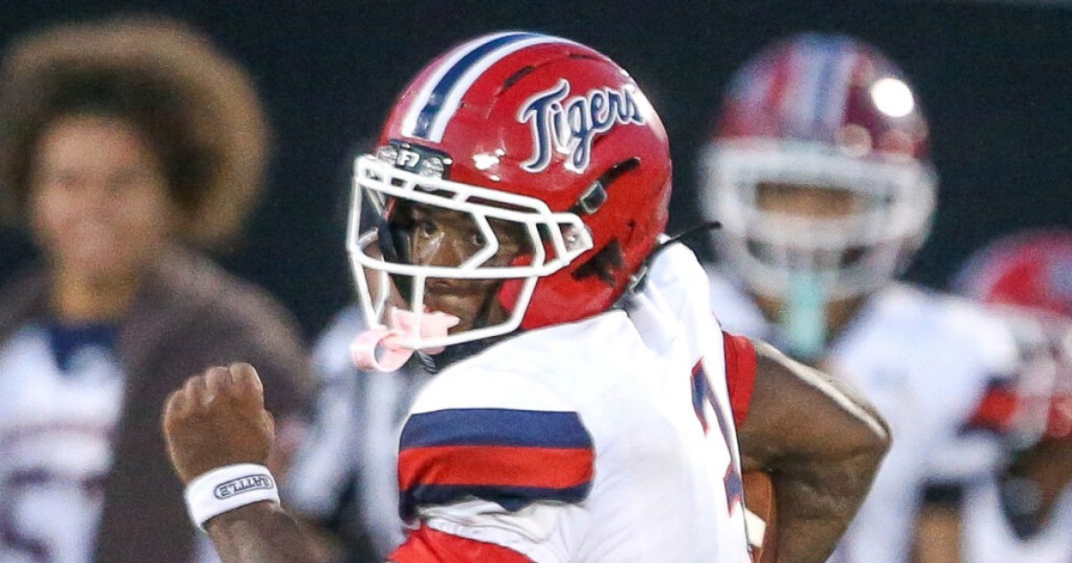 Spell returns with three TDs as Tigers rout Indiana